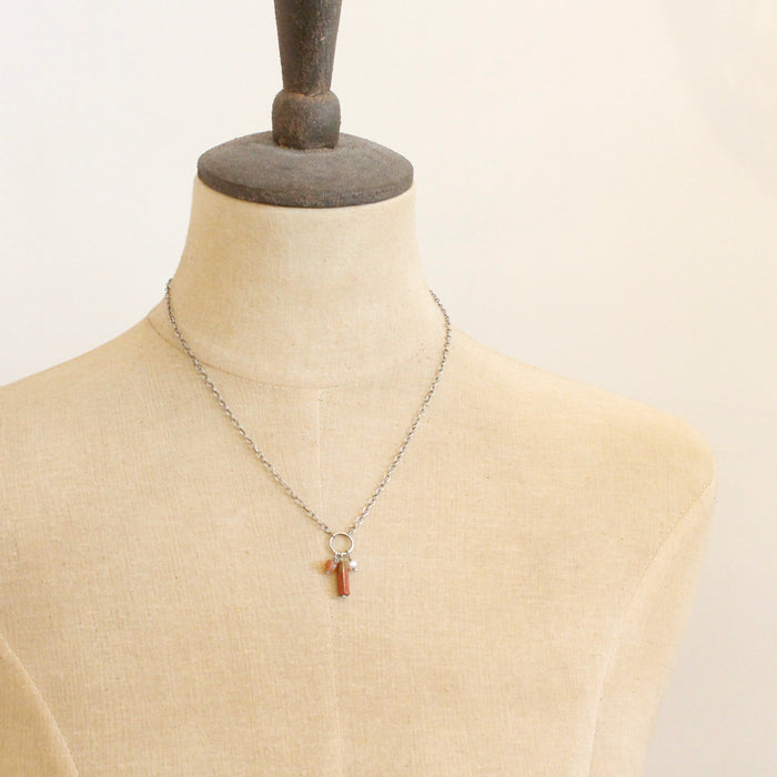 A mannequin wearing the canyon sydney charm necklace.
