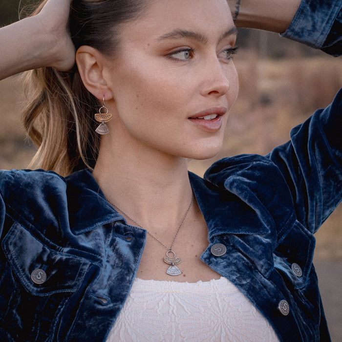 A model wearing the asmi mixed duo set