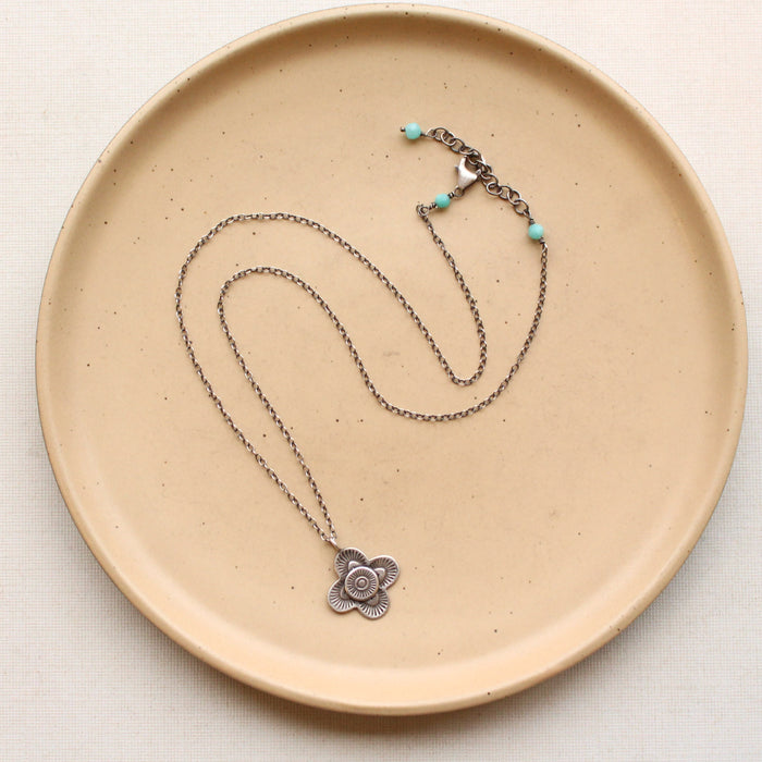 The layered talara necklace styled to show the adjustable lobster clasp closure