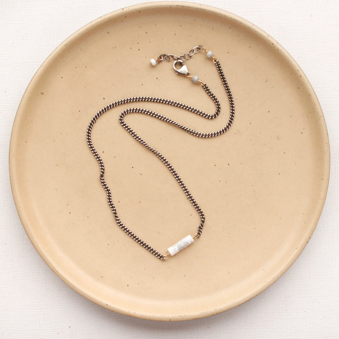 The sydney howlite necklace styled to show the adjustable lobster clasp closure