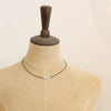 The sydney howlite necklace styled on a mannequin to show the length