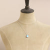 A mannequin wearing the golden hills turquoise necklace