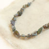 A close up photo of the raw opals in the knotted opal necklace