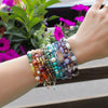 The entire collection of the Mix Tape bracelets styled on a wrist
