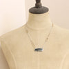 A mannequin is wearing the modern imperial jasper necklace