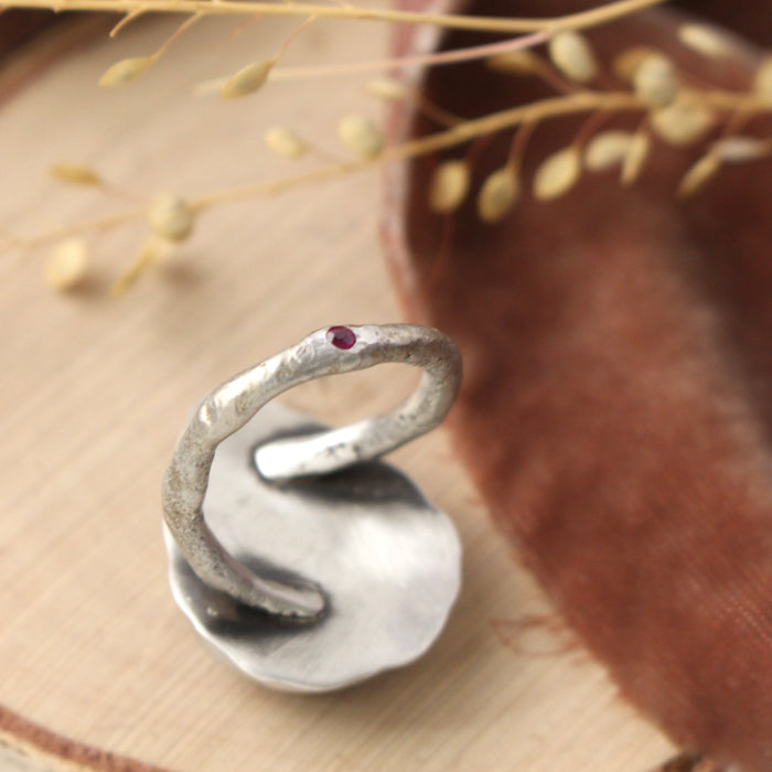 A view of the little ruby and reticulated band on the organic thulite ring
