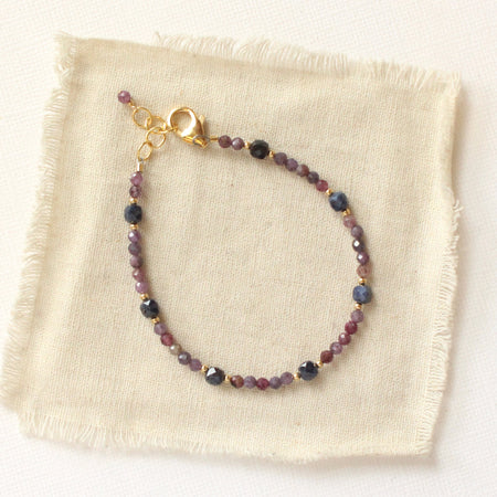 The sapphire cleo bracelet styled on tan linen