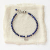 The mini cactus flower sodalite bracelet styled on tan linen