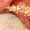 The sun rise stacking ring styled on wood with orange velvet and dried grass