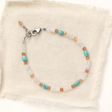 The bondi bracelet styled on tan linen