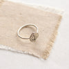 Stamped silver aspen leaf ring showing skinny silver band