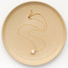 The perfect pearl gold necklace showing the adjustable lobster clasp closure