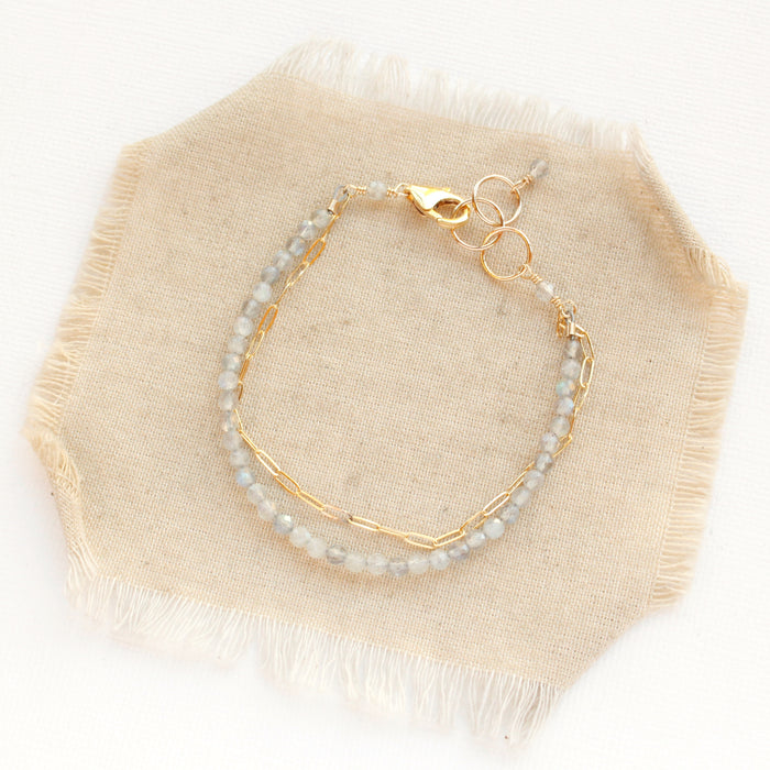 The labradorite double strand bracelet styled on tan linen