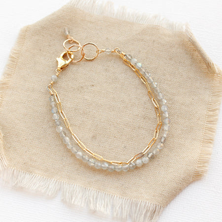 The labradorite double strand bracelet styled on tan linen