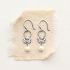 mini scalloped hoop pearl earrings on tan linen