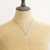 A mannequin wearing the mini talara necklace
