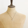 A mannequin wearing the oxidized silver perfect pearl necklace