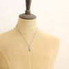 A mannequin wearing the turquoise jolie necklace